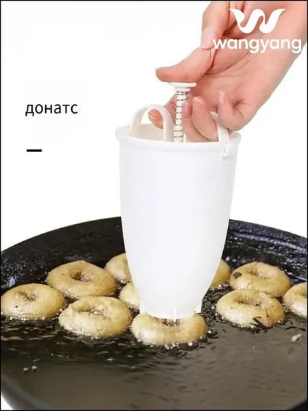 Аппарат для пончиков аппарат для пончиков; электрическая пончиковница; мини-фабрика пончиков; автомат для жарки пончиков; прибор для выпечки пончиков;автоматический нагрев; антипригарное покрытие; регулировка температуры; таймер приготовления; съемные формы; компактный размер, белый