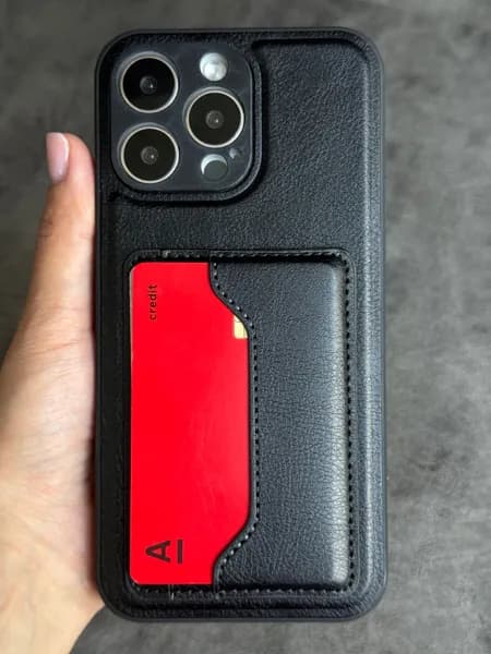 Чехол на iPhone 14 Pro Max черный с двумя карманами для банковских карт и подставкой.