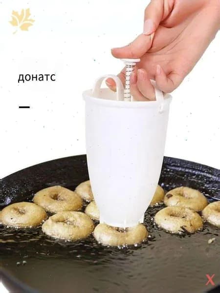 Аппарат для пончиков аппарат для пончиков; электрическая пончиковница; мини-фабрика пончиков; автомат для жарки пончиков; прибор для выпечки пончиков;автоматический нагрев; антипригарное покрытие; регулировка температуры; таймер приготовления; съемные формы; компактный размер, белый