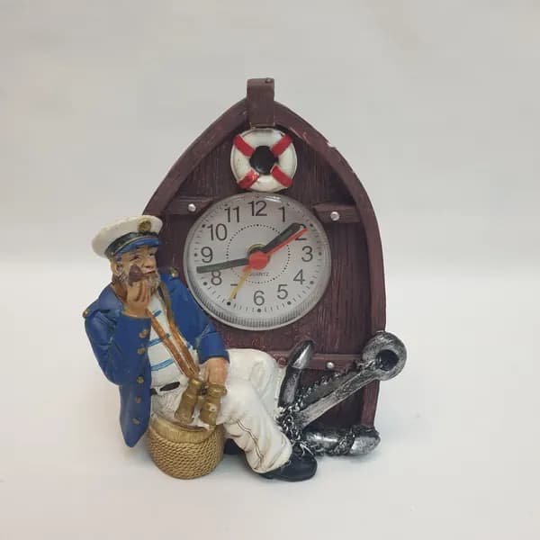 Часы настольные с моряком 9х7х12 см, кварцевые, рабочие, композитный материал.