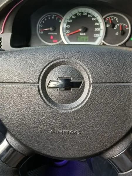 Наклейка "Эмблема на руль Chevrolet Lacetti", черный