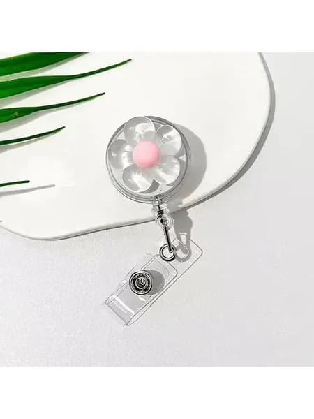 Значок в виде цветка, легко застегивающийся на пряжку