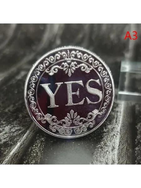 Памятная металлическая монета YESNO