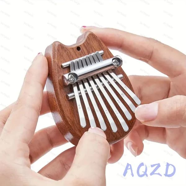 Мини-8-клавишное пианино Kalimba Thumb, подарок для начинающих, любителей музыки и игроков, милый аксессуар-брелок с подвеской в виде инструмента-