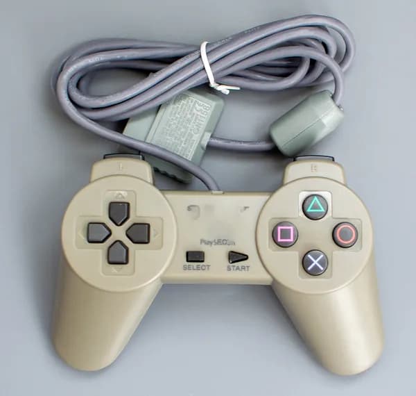 Джойстик приставки Sony PS серый