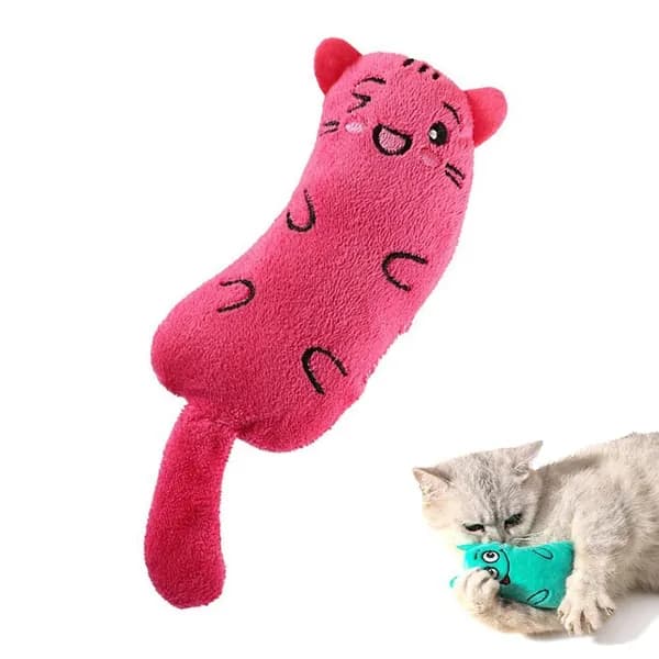 Игрушечная кошка с мультяшным выражением мордочки