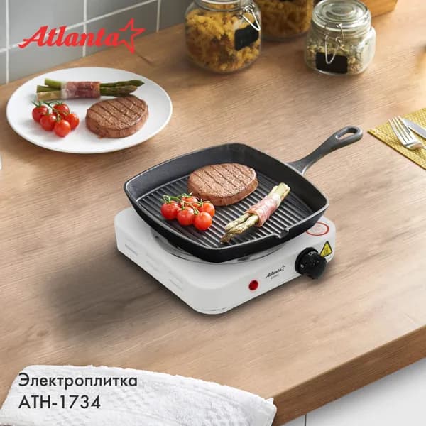 Электрическая настольная плита Atlanta ATH-1734 (white), мощность 1000 Вт, спиральный ТЭН 14 см, стальной корпус с эмалевым покрытием, регулятор температуры (термостат)