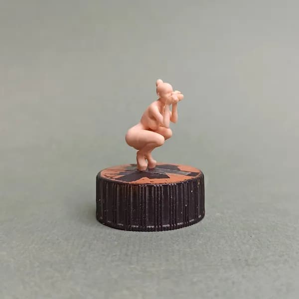 Девушка фотограф. Миниатюра в масштабе 1/43.