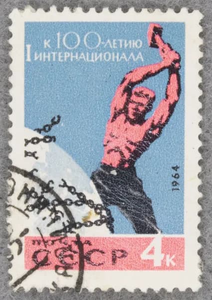 Почтовая марка "Рабочий, разбивающий цепи капитализма". Номинал 4 коп. СССР. 1964 год. (Загорский 3004)