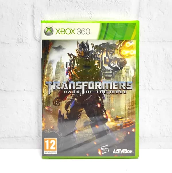 Transformers Dark Of The Moon Английский язык Видеоигра на диске Xbox 360. Товар уцененный