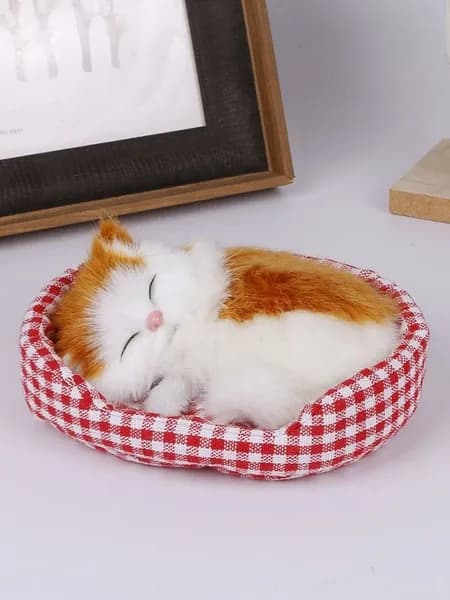 Плюшевый игрушечный котенок