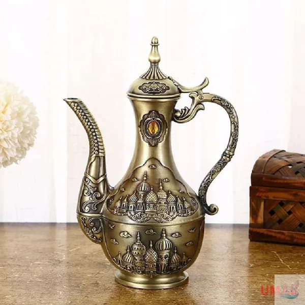 Бронзовый винтажный чайник