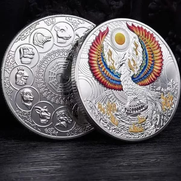 На оборотной стороне недавно выпущенной памятной золотой монеты Фламинго изображены 12 китайских знаков зодиака