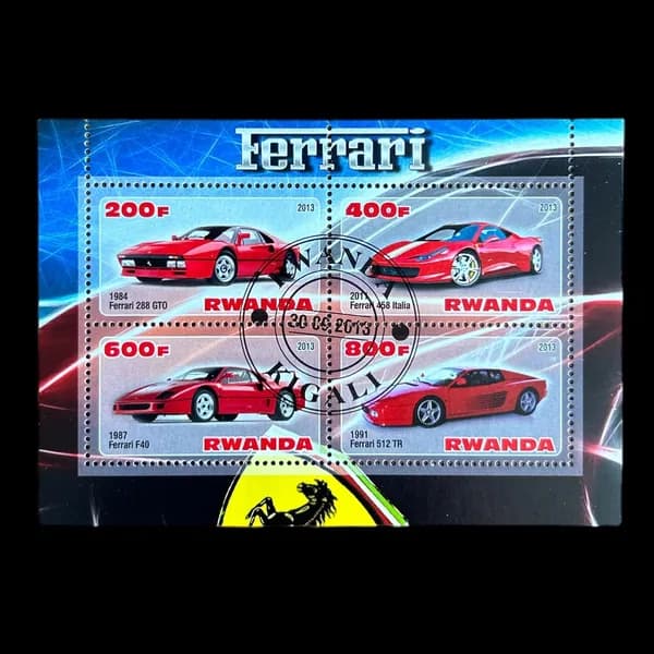 Почтовый блок. Спортивные автомобили "Ferrari". Руанда 2013 год