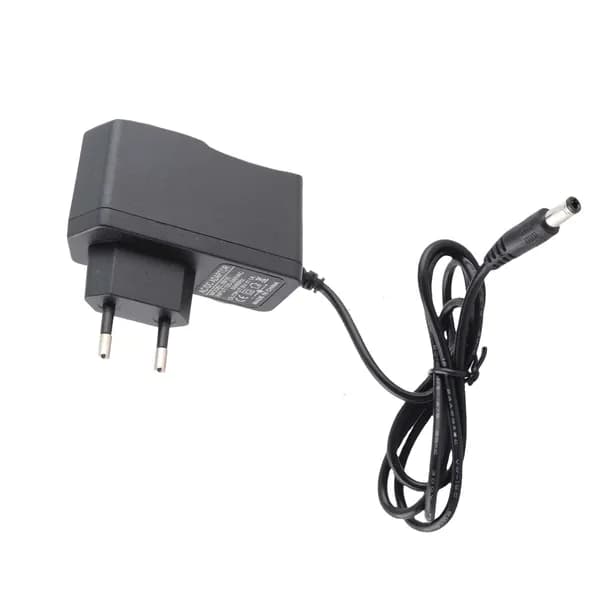 Универсальный адаптер питания 9V AC/DC для электрогитарных одиночных эффектов черного цвета из пластика размером 8x5x2 см с кабелем 90 см, разъемом