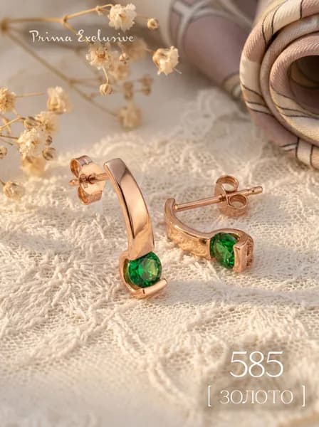 Серьги гвоздики женские из золота 585 пробы с изумрудом