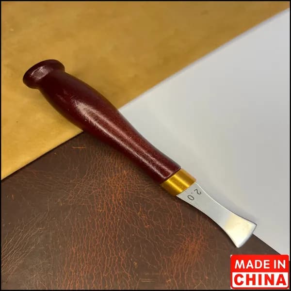Инструмент для работы с кожей, мехом