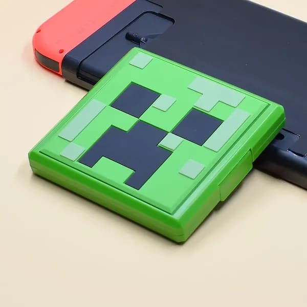 Эта стильная коробка для игровых картриджей Nintendo Switch 2 идеально подходит для безопасного хранения ваших любимых игр и карт памяти.