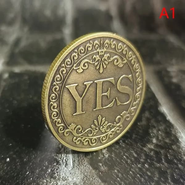 Памятная металлическая монета YESNO