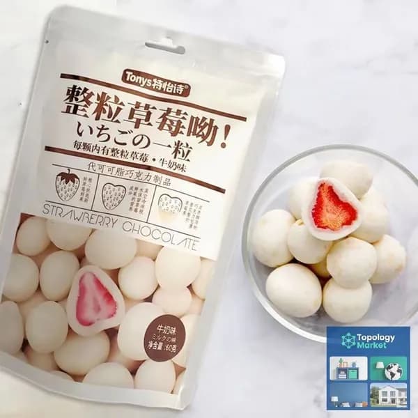 Замороженная смесь из цельных ягод клубники с начинкой из шоколада, молока и зеленого чая, в упаковке 60 г.