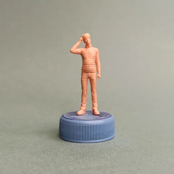Молодой человек в ушанке. Фигурка в масштабе 1/43.