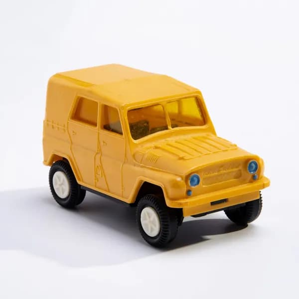 Машинка игрушечная УАЗ-469 жёлтого цвета, пластмасса, металл, СССР, 1970-1990 гг.