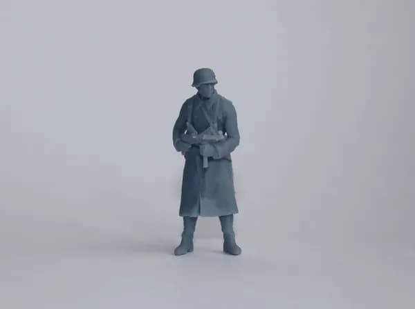 "Немецкий солдат в шинели №2" Фигурка в масштабе 1:43 для диорам и макетов. Высота фигурки 4 см.