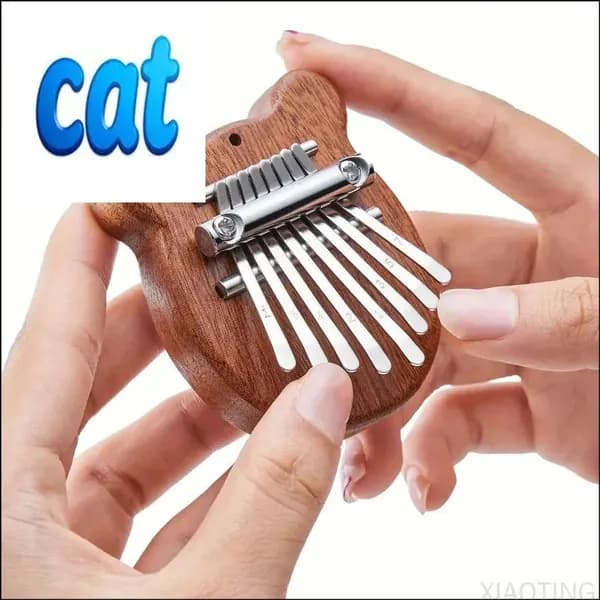 Мини-8-клавишное пианино Kalimba Thumb, подарок для начинающих, любителей музыки и игроков, милый аксессуар-брелок с подвеской в виде инструмента