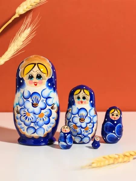 Матрёшка деревянная в голубом платье 10 см