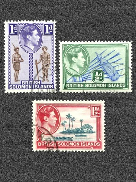 Соломоновы острова-1939. Король Георг VI. Культурные традиции, предметы быта, оружие и виды островов. Серия из 3 почтовых марок. Гашение