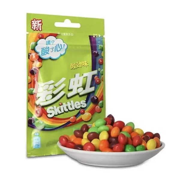 Сладости Skittles с необычным сочетанием цветов и фруктов в удобной упаковке