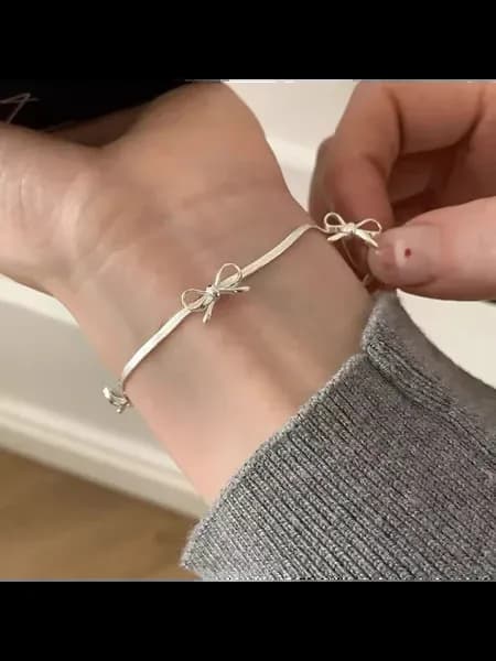 Серебряный браслет с бантом, цвет 01