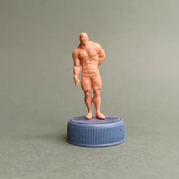 Бодибилдер на пляже. Фигурка в масштабе 1/43.