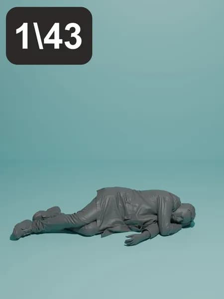 Мужчина спит в одежде. Фигурка в масштабе 1:43