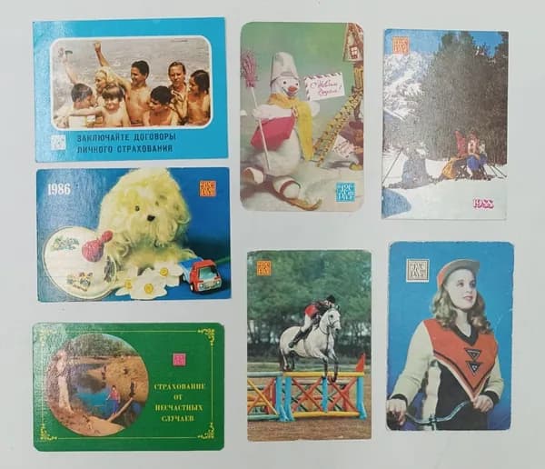 Семь календариков Госстрах и страхование. 1976-88 годы. Состояние на фото