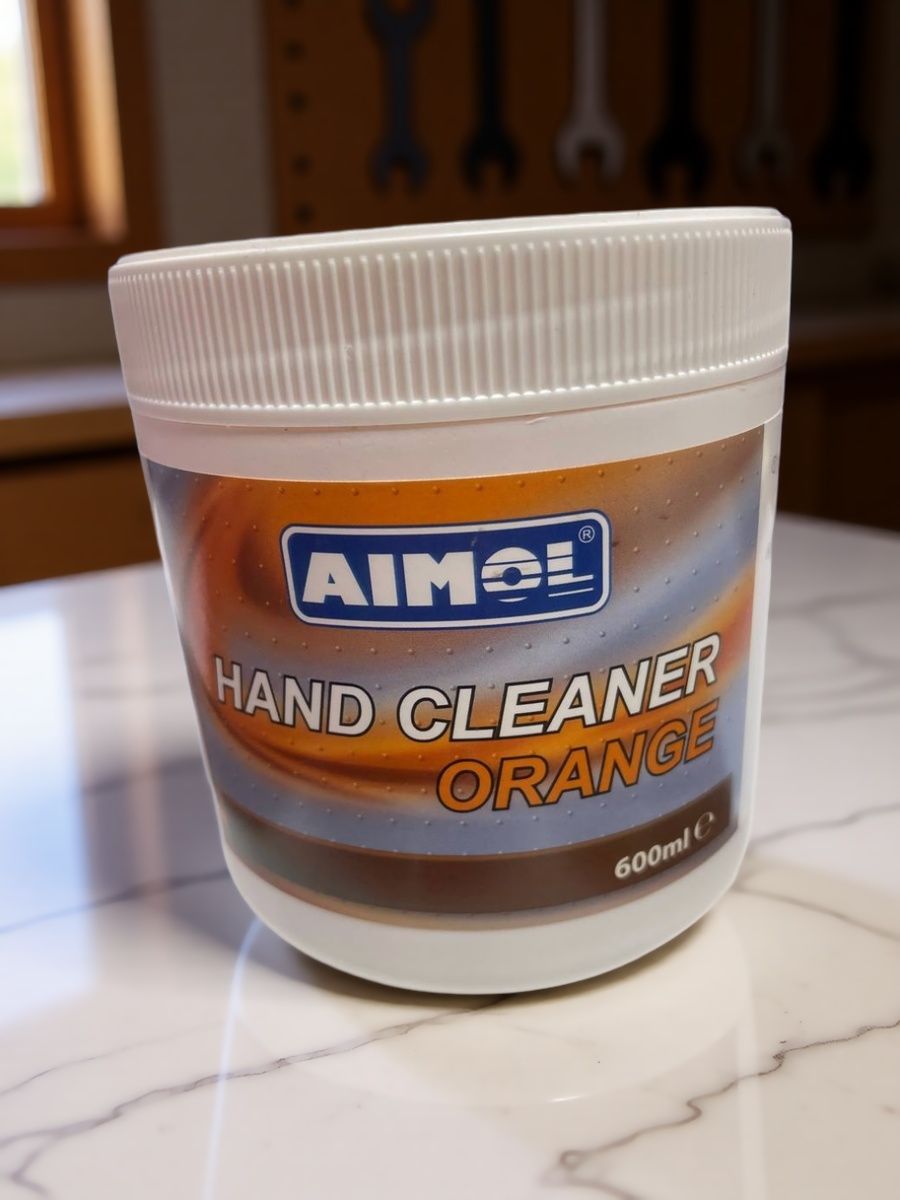 Гель-очиститель для рук AIMOL Hand Cleaner Orange с абразивом и экстрактом апельсина, от сильных загрязнений (масла, смазки, краски), 600 мл