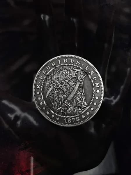Монета Санта Муэрте