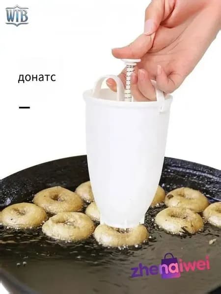 Аппарат для пончиков аппарат для пончиков; электрическая пончиковница; мини-фабрика пончиков; автомат для жарки пончиков; прибор для выпечки пончиков;автоматический нагрев; антипригарное покрытие; регулировка температуры; таймер приготовления; съемные формы; компактный размер, белый